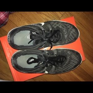 Nike Fury Black Sneakers.